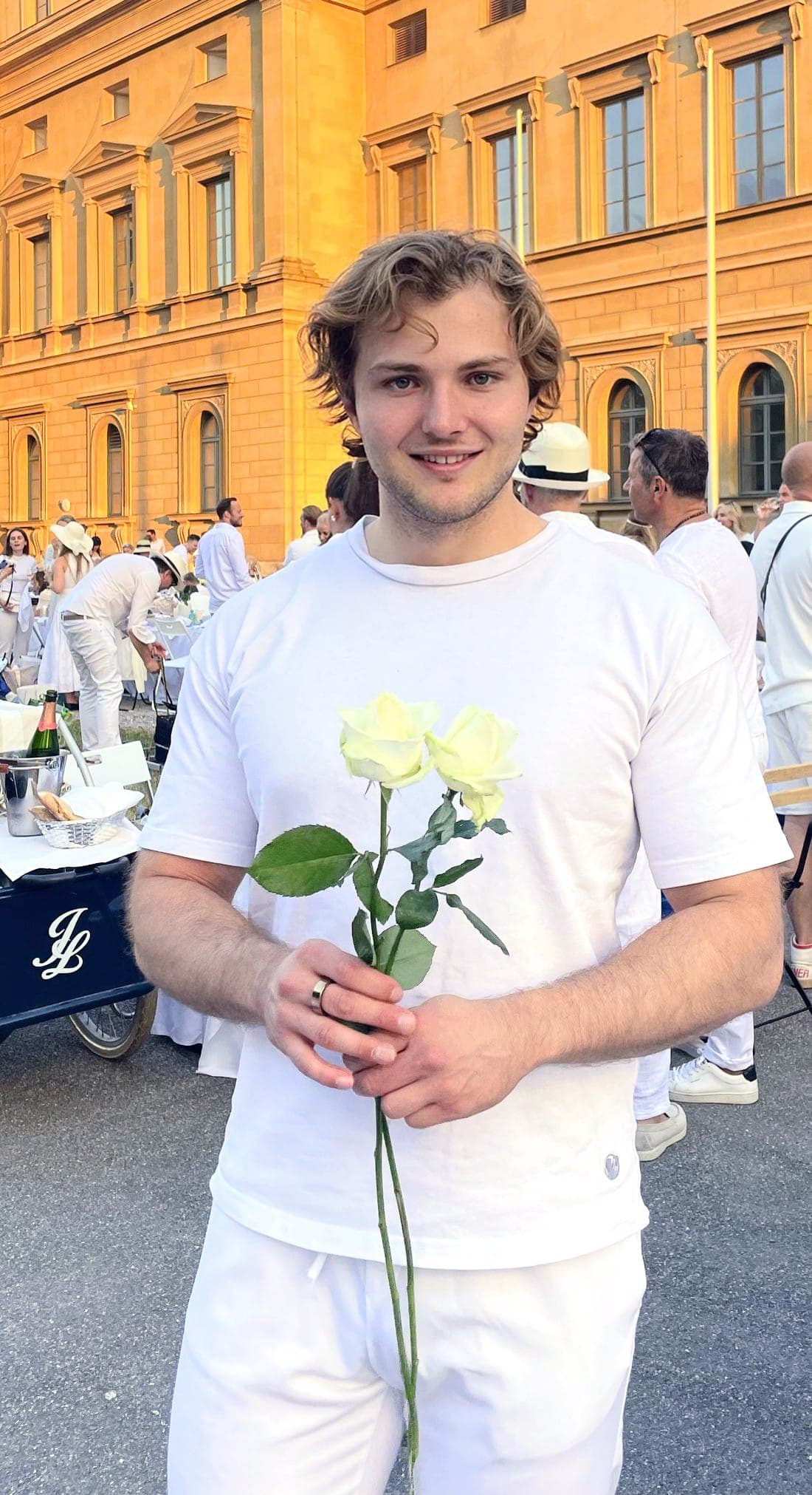 Sacha Martinelle before the Munich Residenz at golden hour